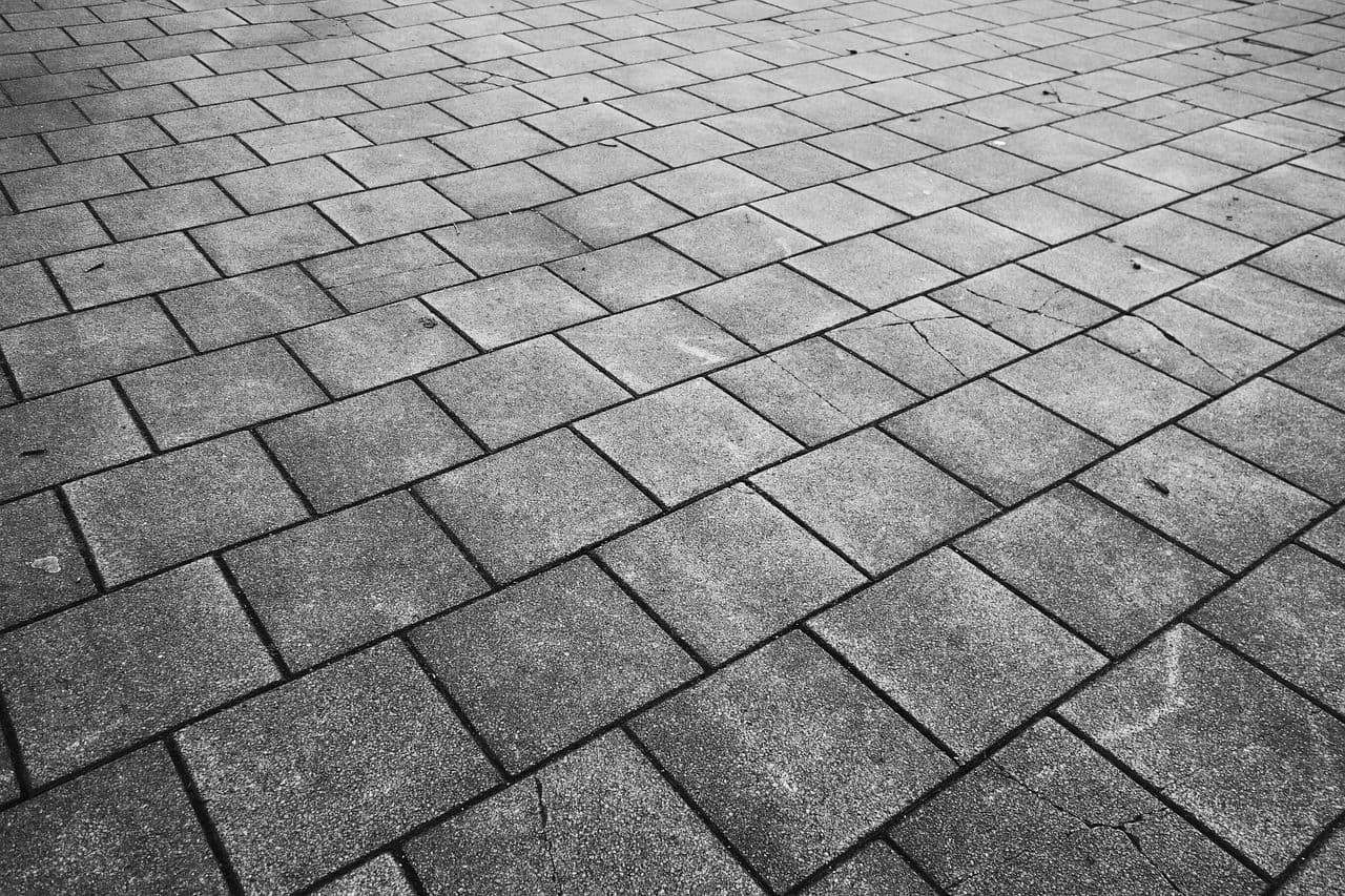 Close view of asphalt shingle courses across a roof slope